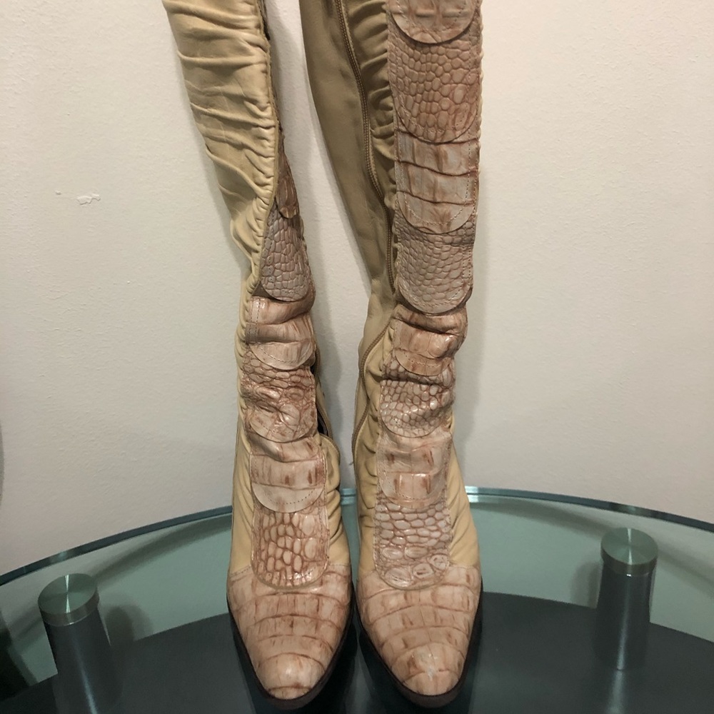 Heeled knee high boots